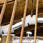 Building with Ducts in Conditioned Spaces